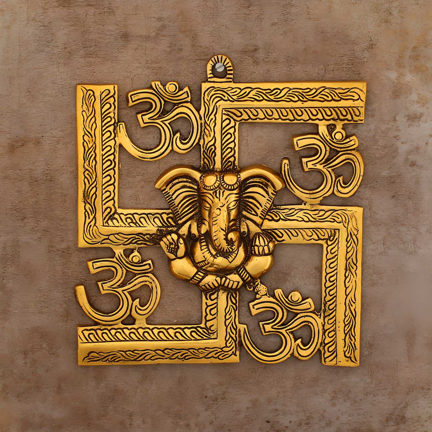 eCraftIndia Lord Ganesha on Om Swastik Metal Golden Wall Hanging